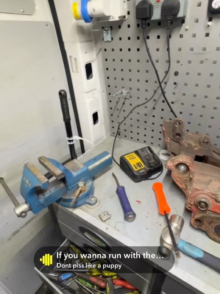 Workbench in the Bevan and Co. van with vice and tools